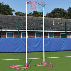 FREESTANDING NETBALL POST PAIR, PINK RING AND BASE, WHITE POST