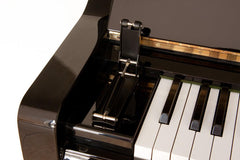 Soft-closing mechanism for upright pianos