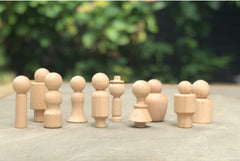 WOODEN COMMUNITY FIGURES