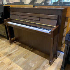Pre-owned Yamaha P110NT upright piano in satin walnut