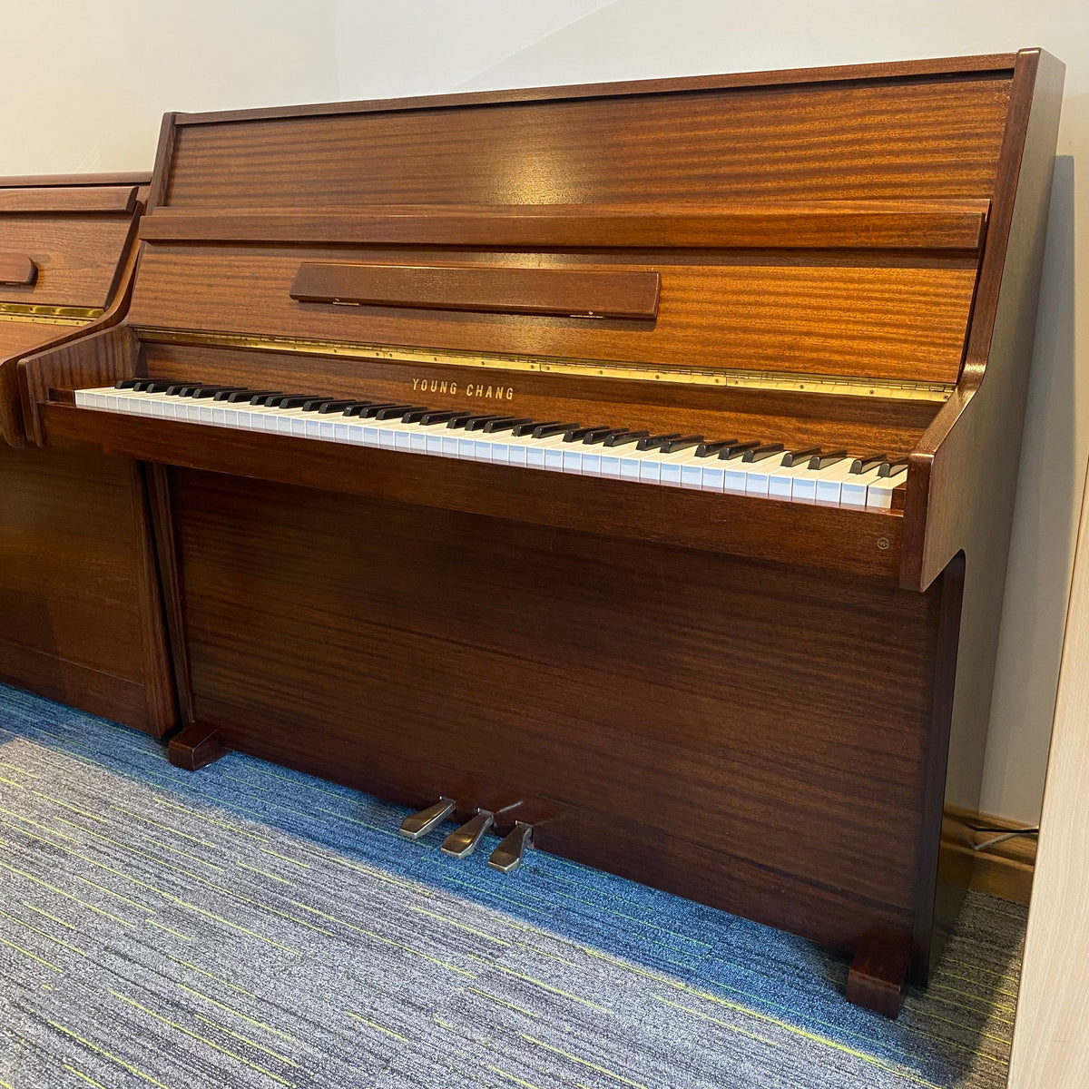 Pre-owned Young Chang U109 upright piano in satin mahogany