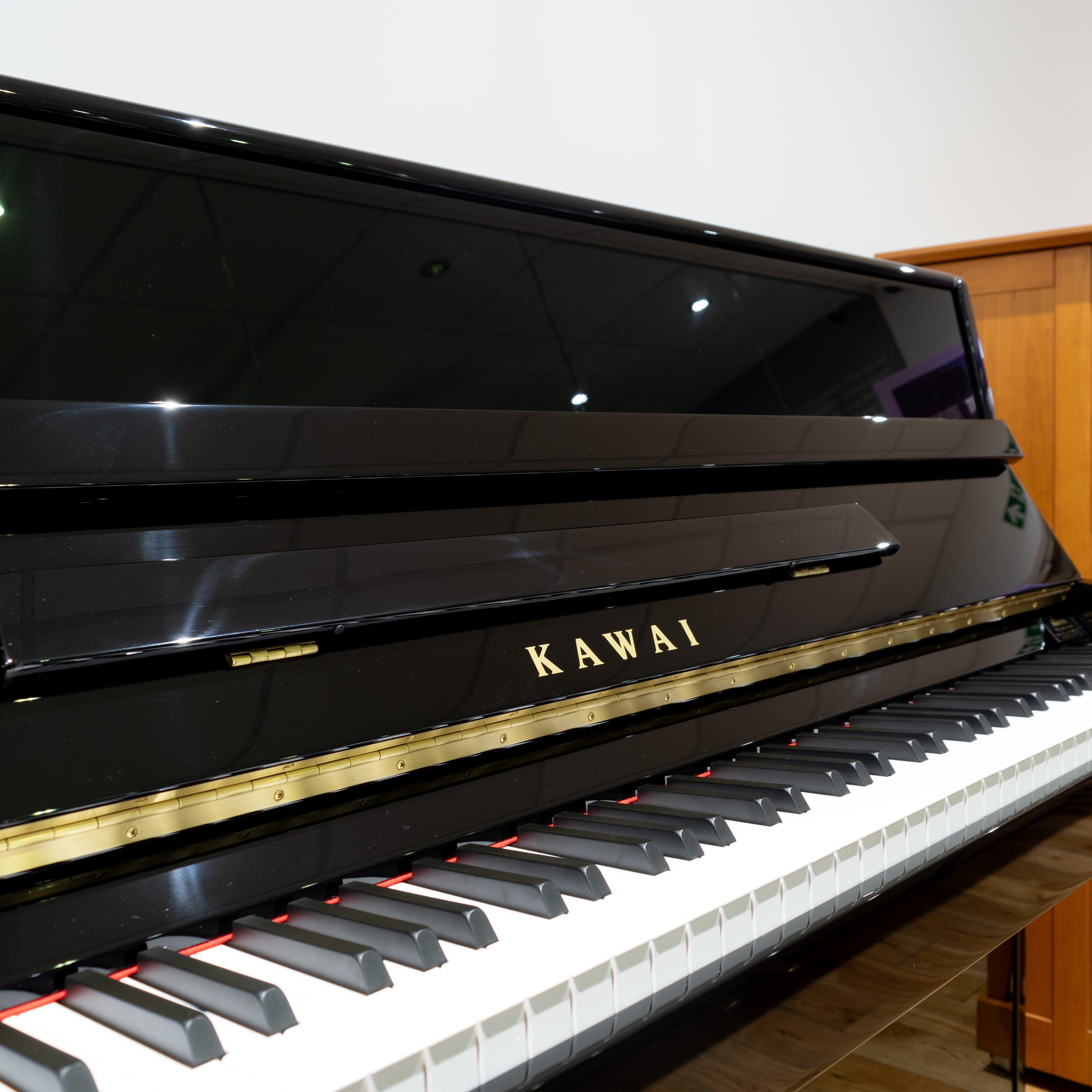 Kawai K-15E upright piano - Polished Ebony