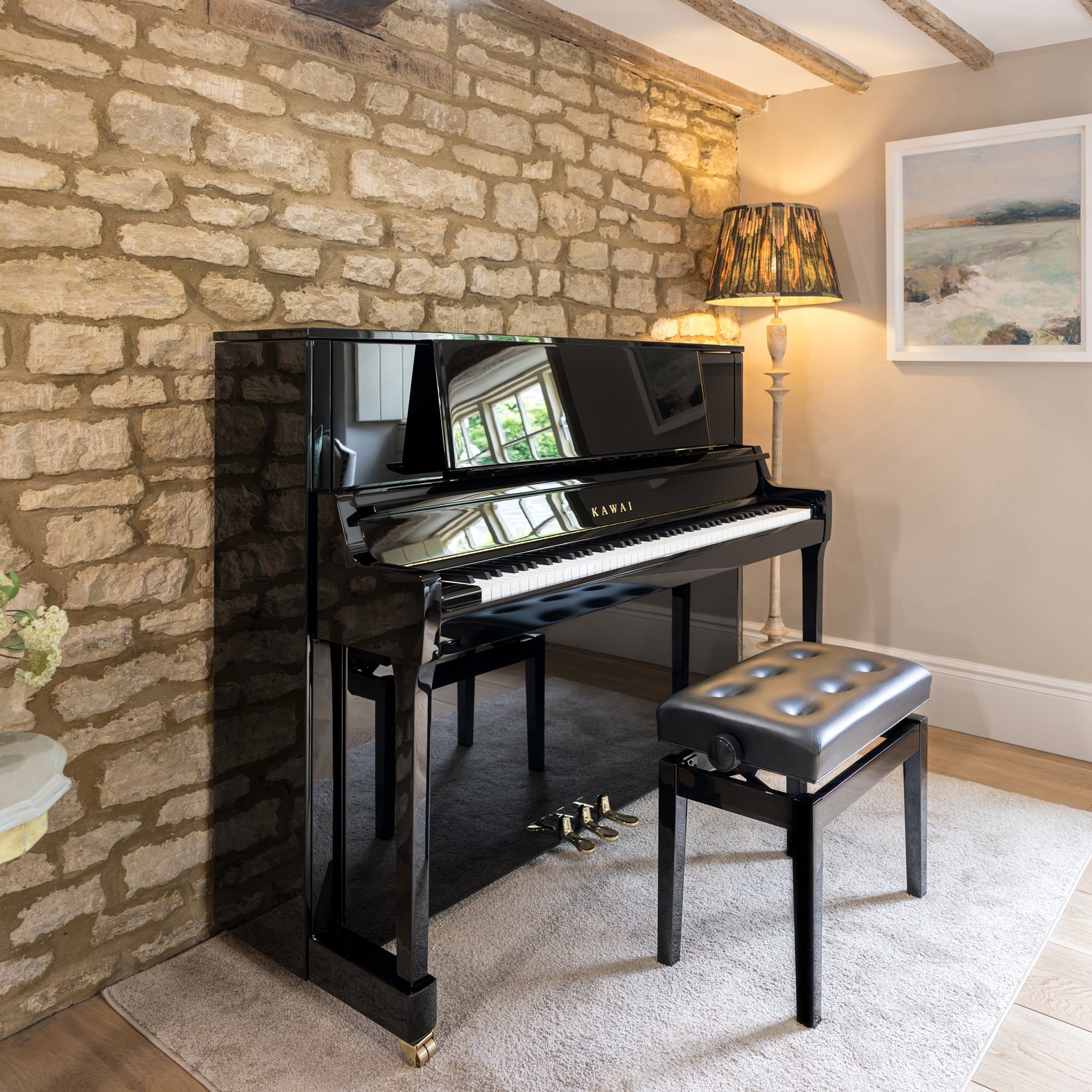 Kawai K-400 upright piano in polished ebony