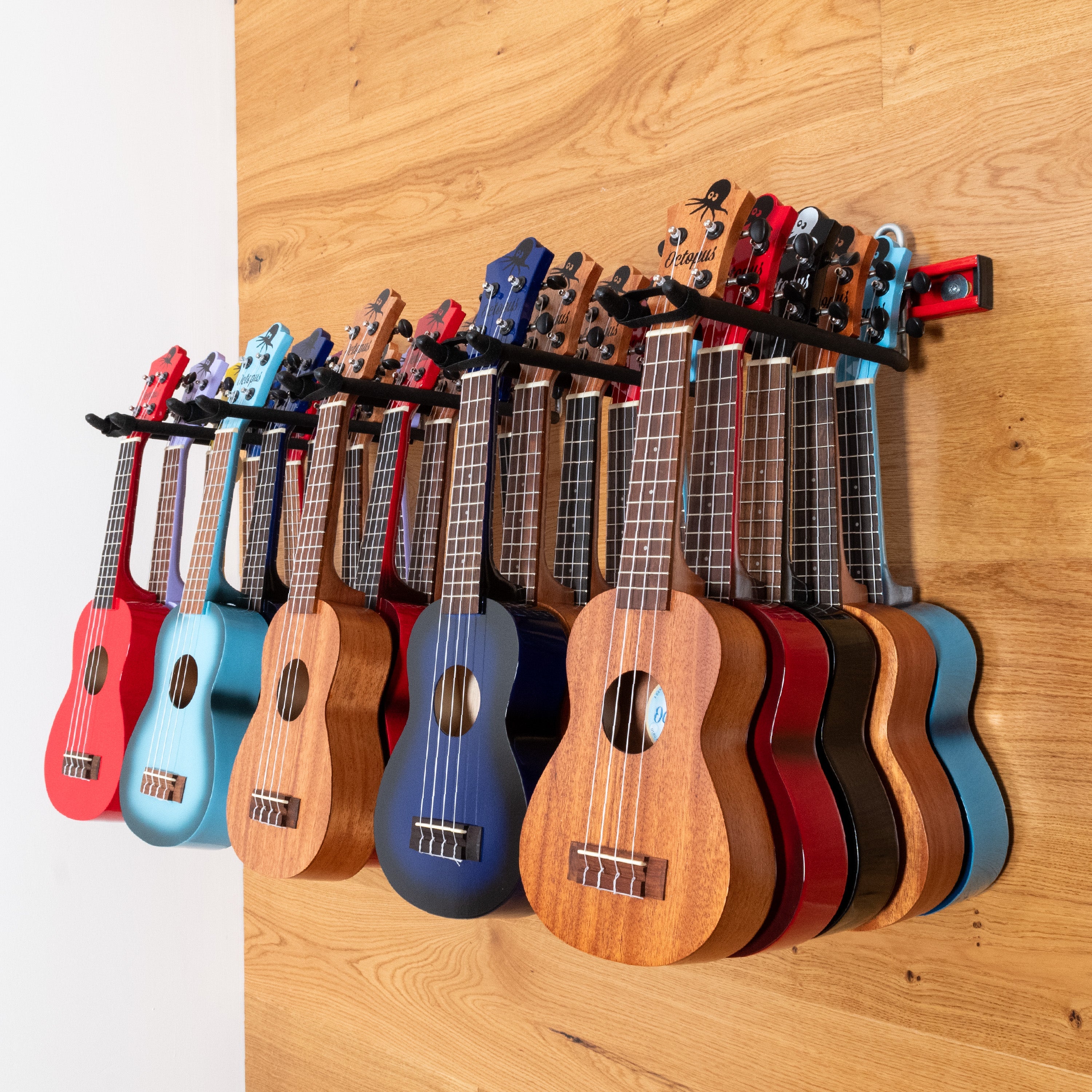 Ukulele wall hanger for up to 25 ukuleles - Red